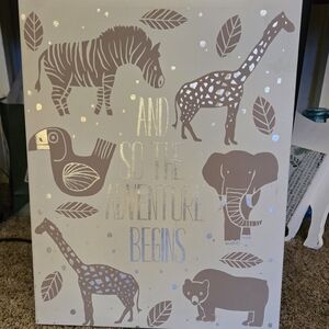 Canvas painting of various animals. Zebras giraffe,  elephant  bear, and bird.